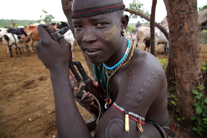 Mursi warrior at a ceremony, Ethiopia