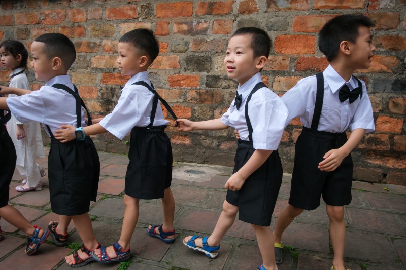 Vietnam, children in the streets of Hanoi